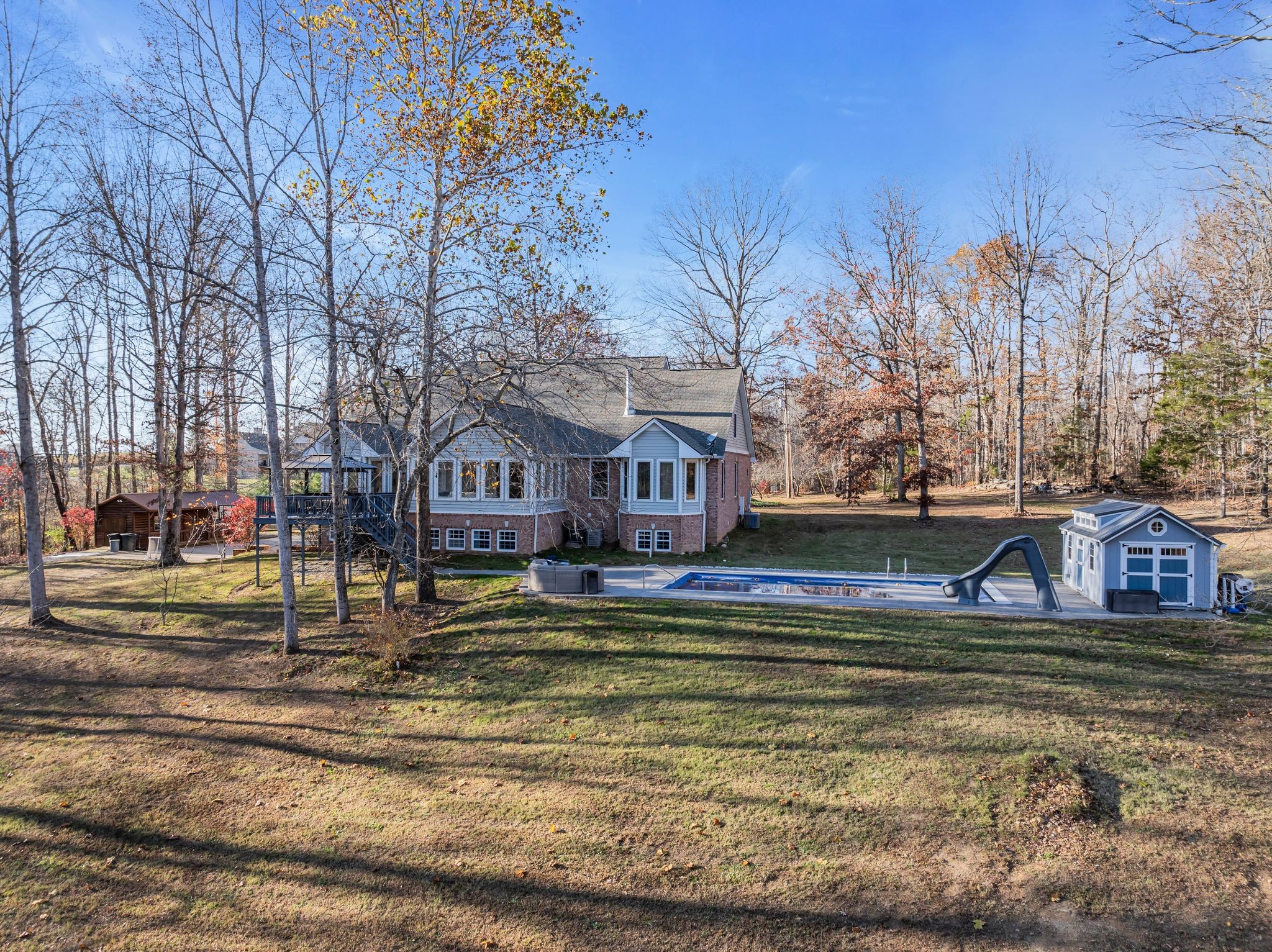 1265 Johnny Hall Road Burns, TN 37029 - Photo 74 of 89 From the stocked pond to the custom pool, this home truly has it ALL!