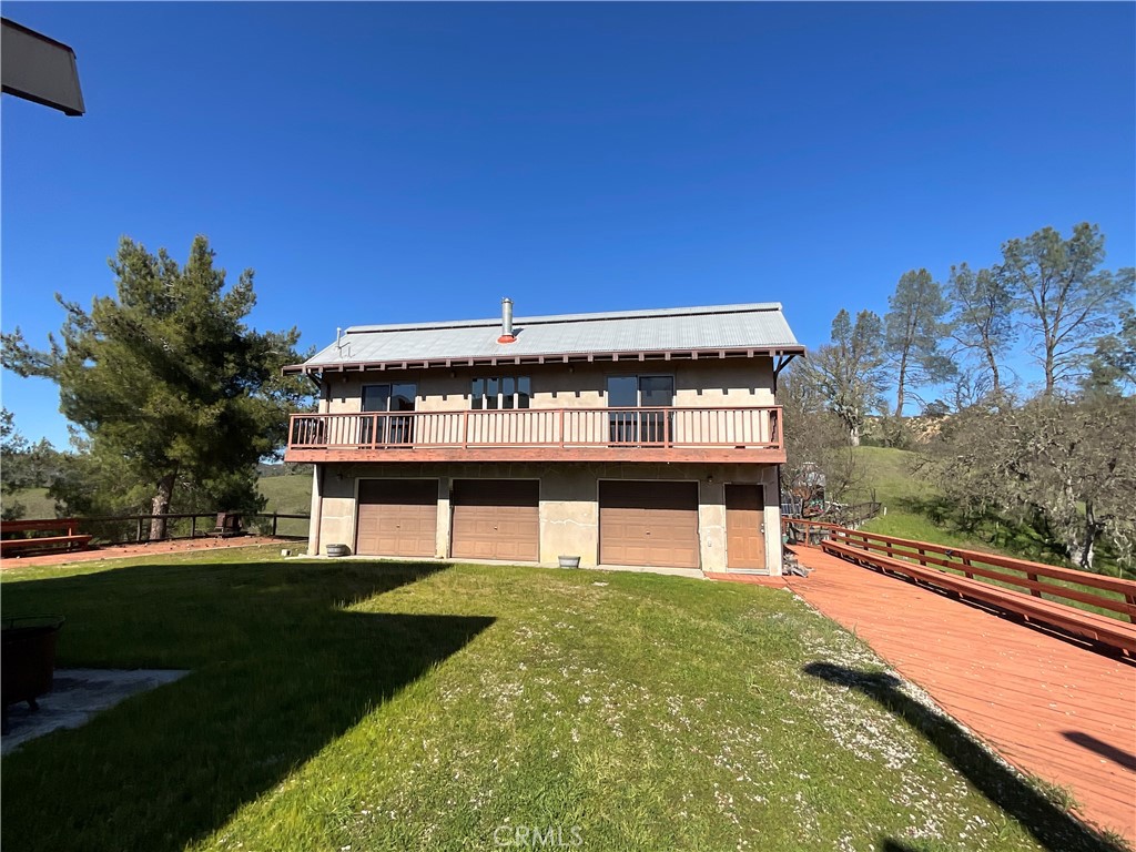 a view of a large pool with a big yard