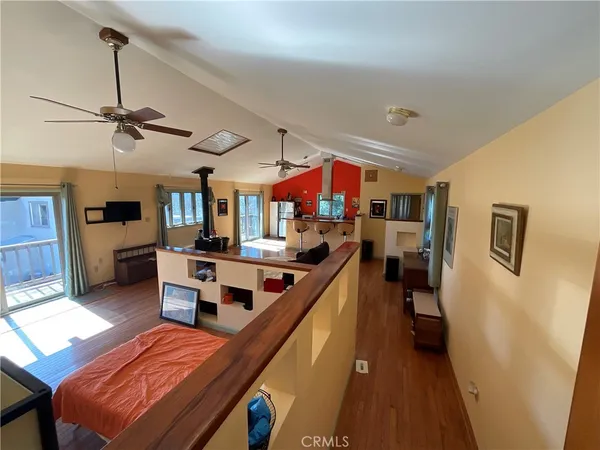 a view of a living room and dining room