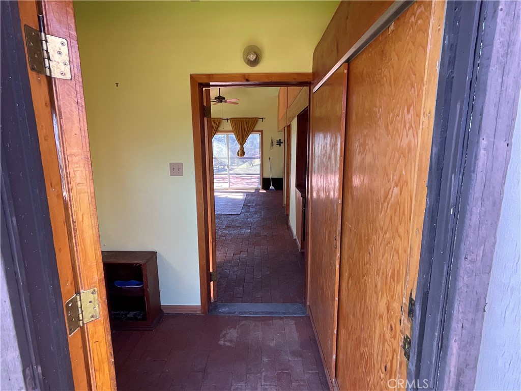 49397 Sapaque Road Bradley, CA 93426 - Photo 21 of 48 a view of a hallway with wooden floor and staircase
