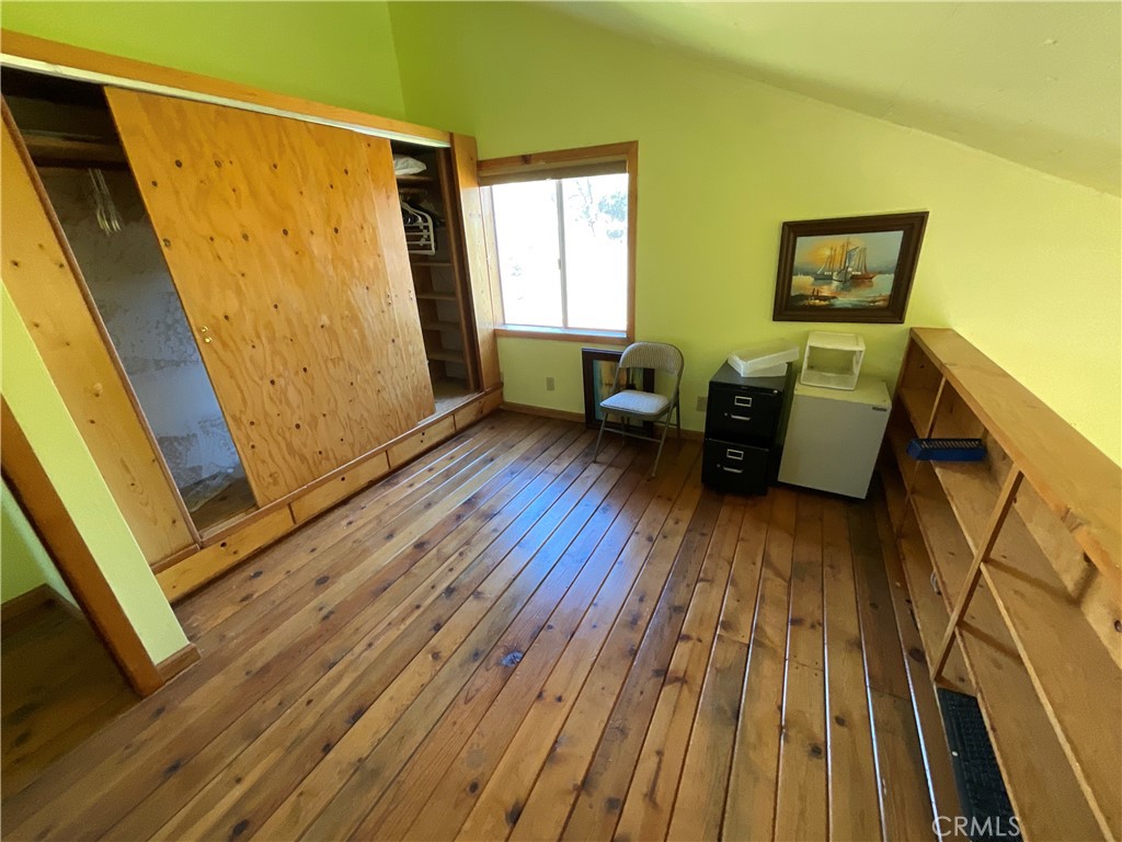 49397 Sapaque Road Bradley, CA 93426 - Photo 29 of 48 a living room with furniture and a wooden floor