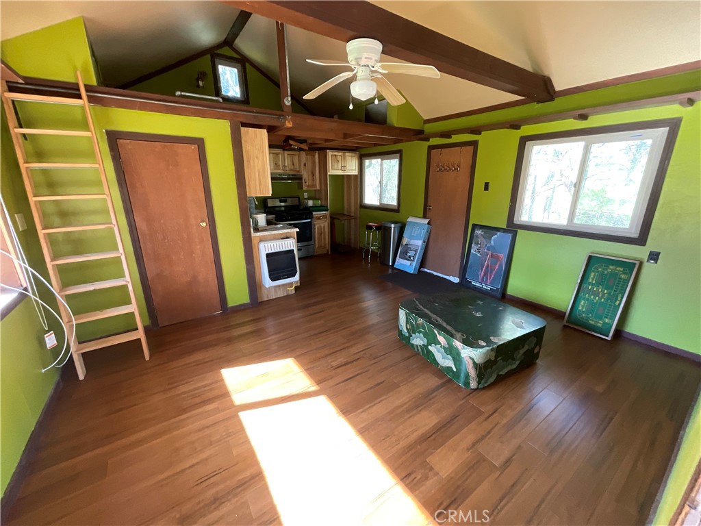 49397 Sapaque Road Bradley, CA 93426 - Photo 35 of 48 a living room with furniture and a flat screen tv