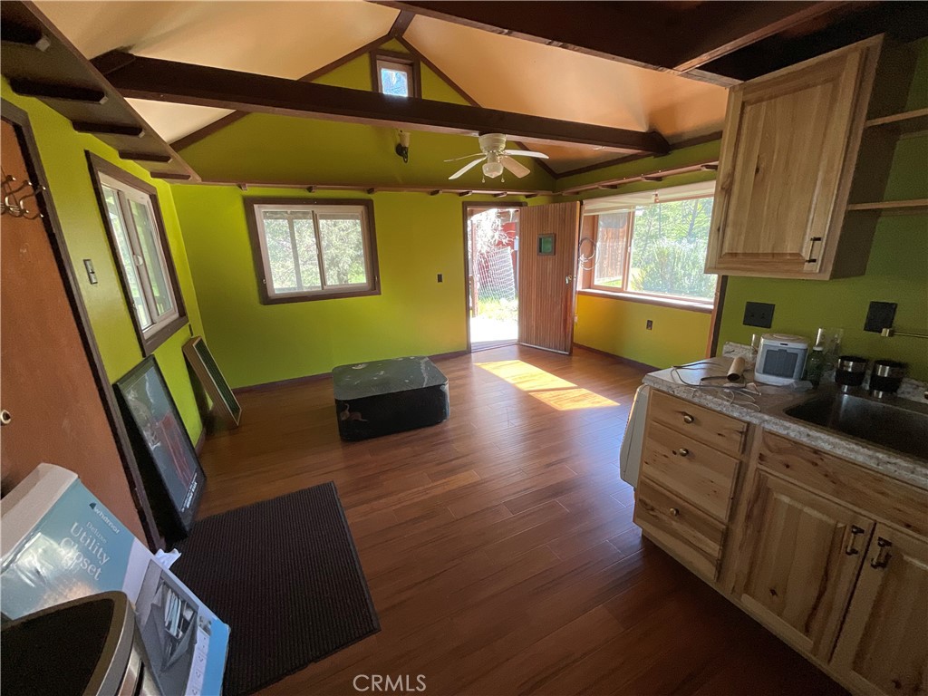 49397 Sapaque Road Bradley, CA 93426 - Photo 39 of 48 a living room with furniture fireplace and a window