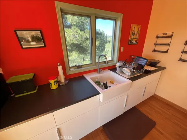 a room with furniture and a window