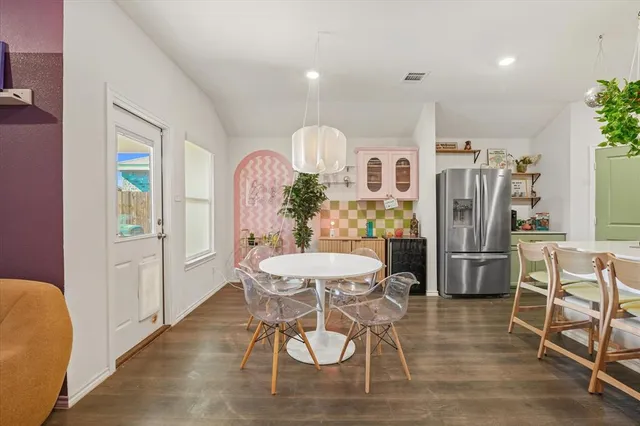 a view of a dining room with furniture