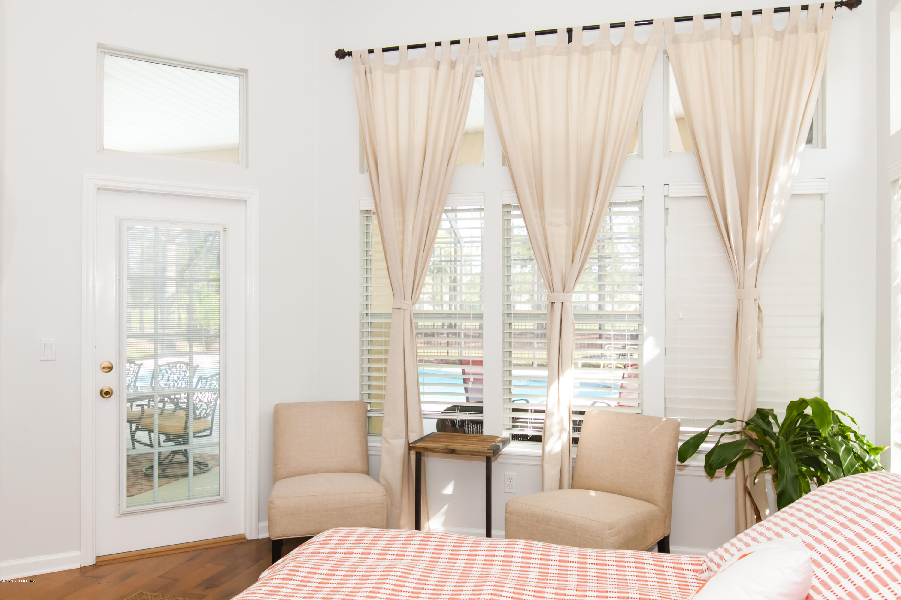 1884 South Landguard Road St. Augustine, FL 32092 - Photo 33 of 66 a living room with furniture and a large window