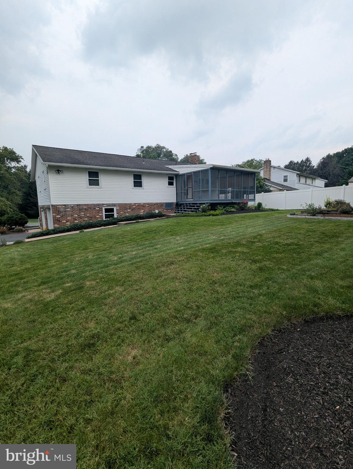 120 Margate Road York, PA 17408 - Photo 6 of 28 a view of a house with a big yard and large trees