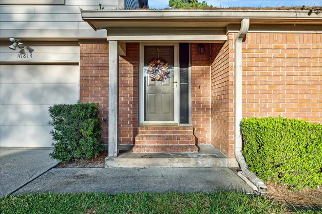 a front view of a house with a porch