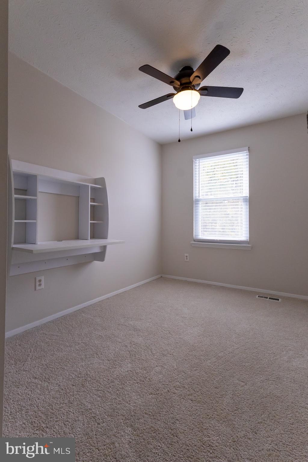 511 Kosoak Road Baltimore, MD 21220 - Photo 32 of 63 a view of an empty room with a window