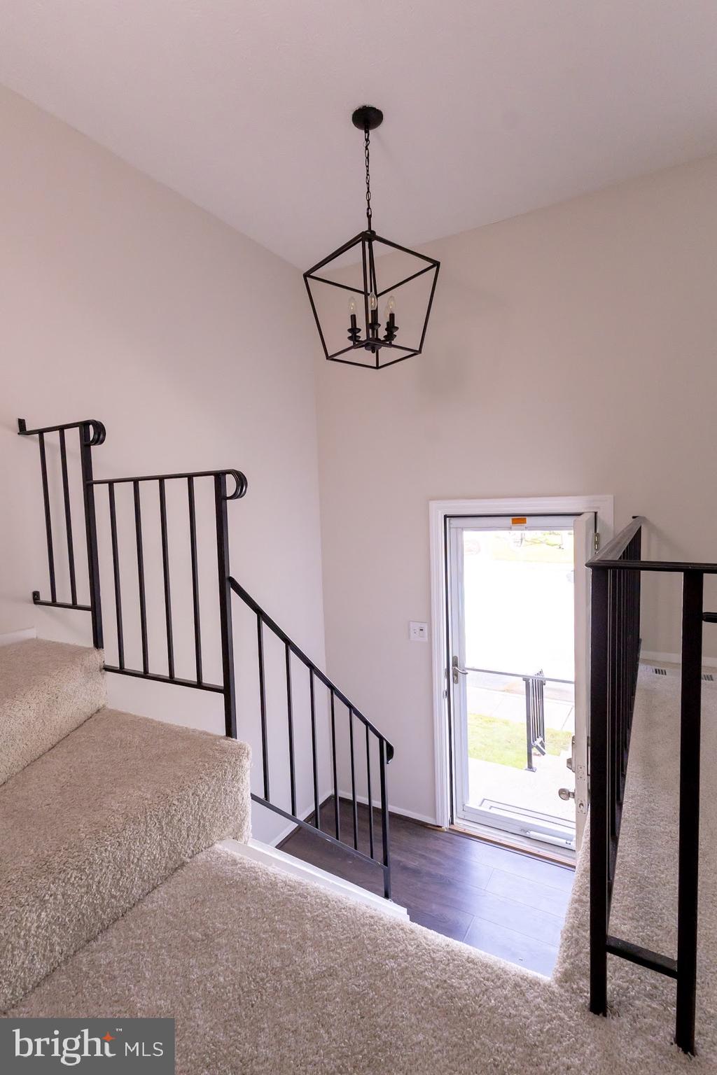 511 Kosoak Road Baltimore, MD 21220 - Photo 40 of 63 a view of a hallway with furniture and a window
