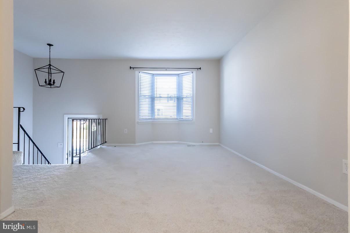 511 Kosoak Road Baltimore, MD 21220 - Photo 4 of 63 a view of an empty room with a window