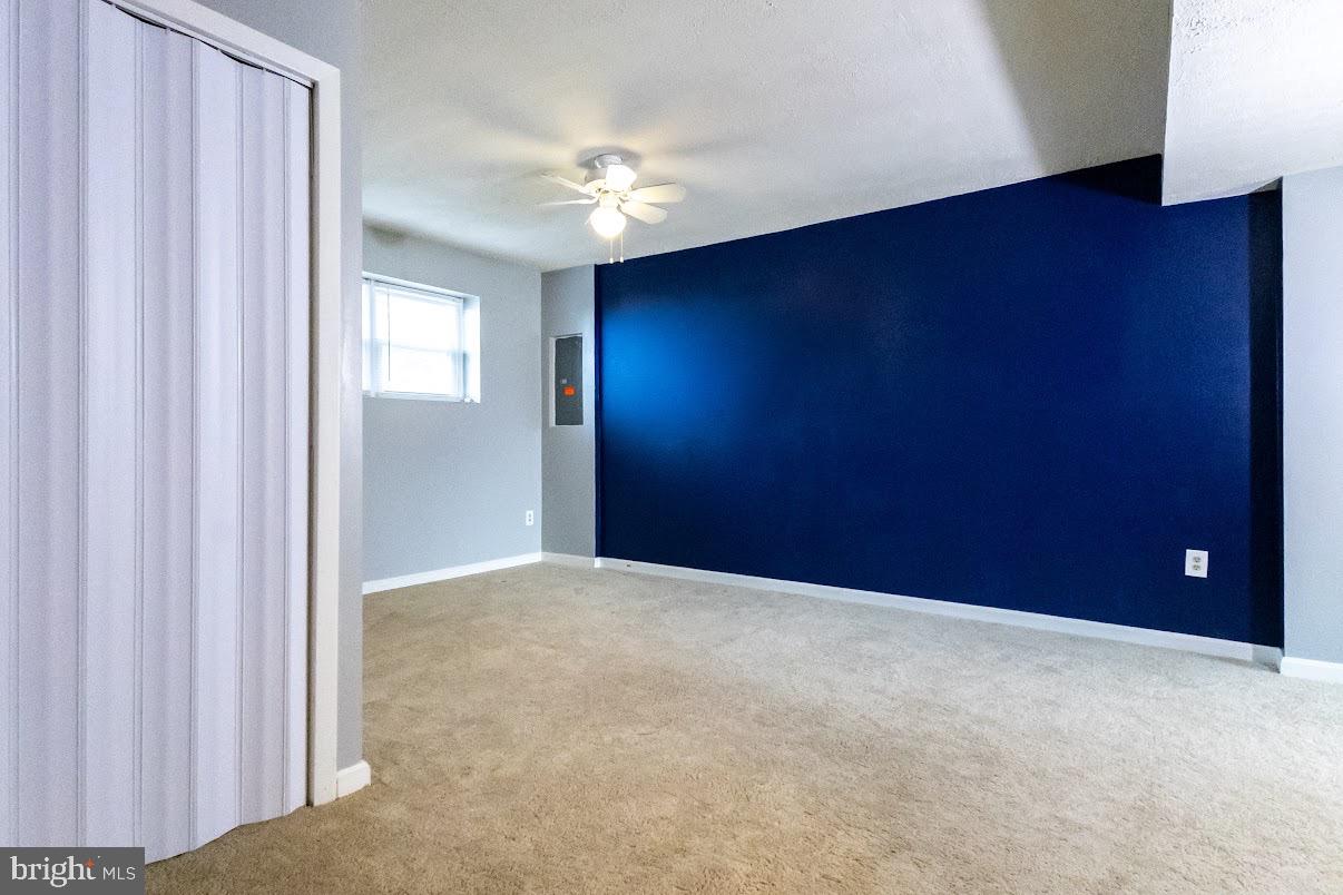 511 Kosoak Road Baltimore, MD 21220 - Photo 44 of 63 a view of an empty room and a window