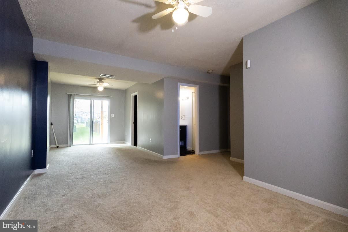 511 Kosoak Road Baltimore, MD 21220 - Photo 45 of 63 a view of an empty room with a window