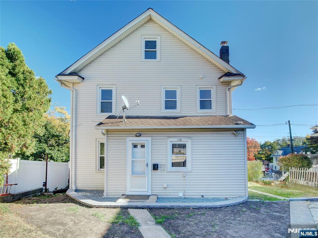 1761 Teaneck Road Teaneck, NJ 07666 - Photo 14 of 14 a view of a house with a yard
