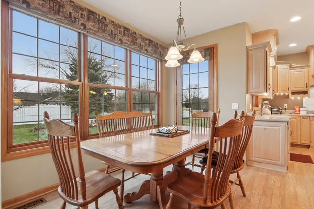 a spacious bathroom with a double vanity sink mirror and toilet