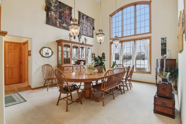 a view of a workspace with furniture