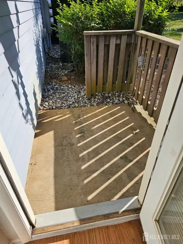 a view of outdoor space with deck and yard