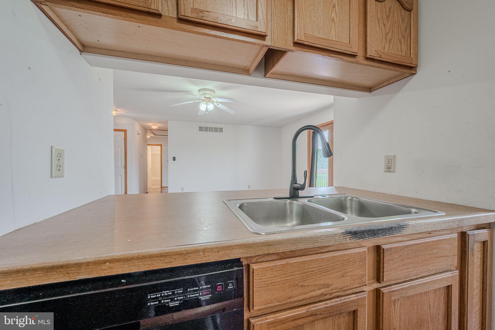 6 Windsor Court Elkton, MD 21921 - Photo 11 of 37 a view of a kitchen counter top a sink and dishwasher