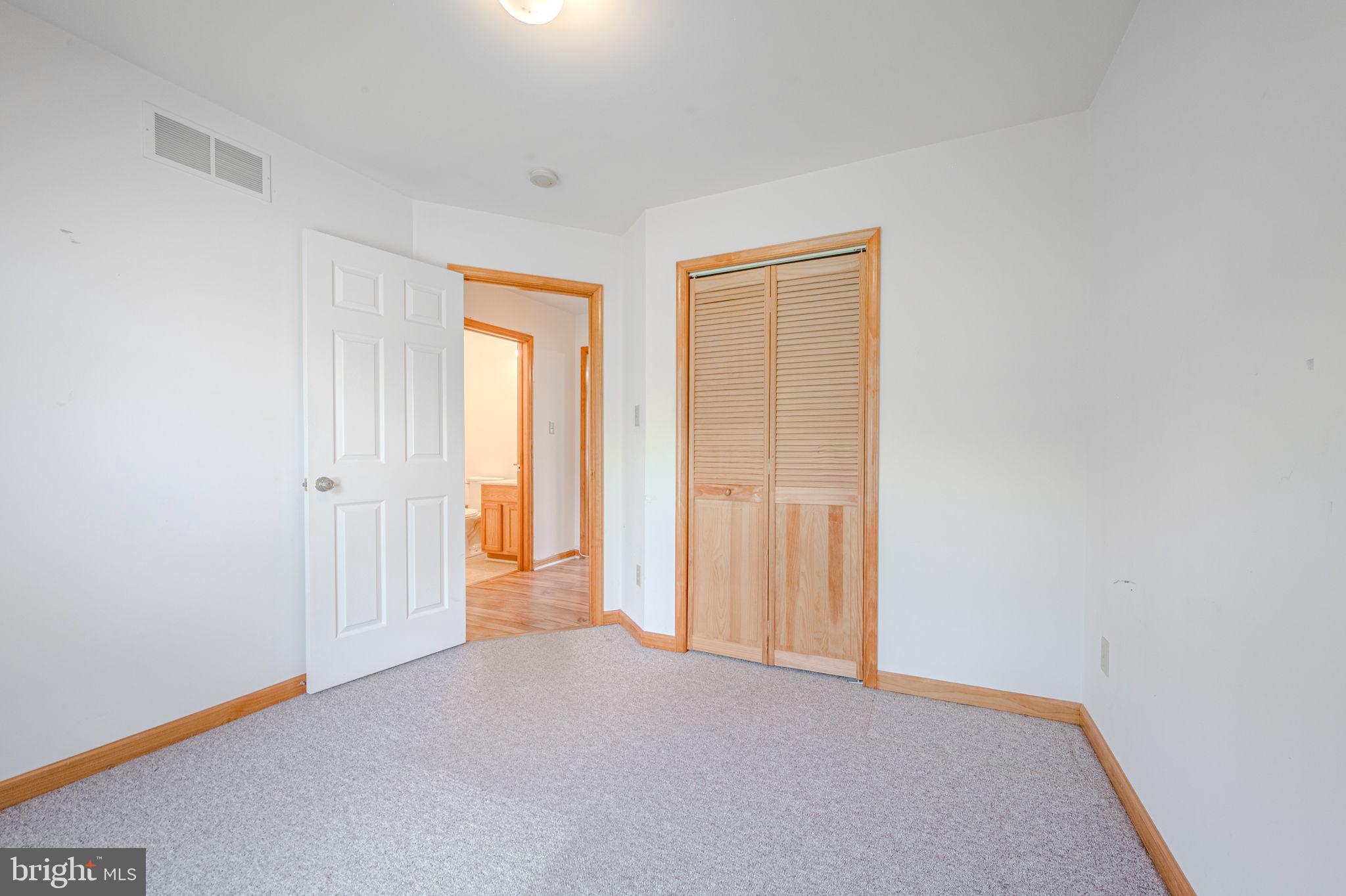6 Windsor Court Elkton, MD 21921 - Photo 16 of 37 a view of an empty room and a window