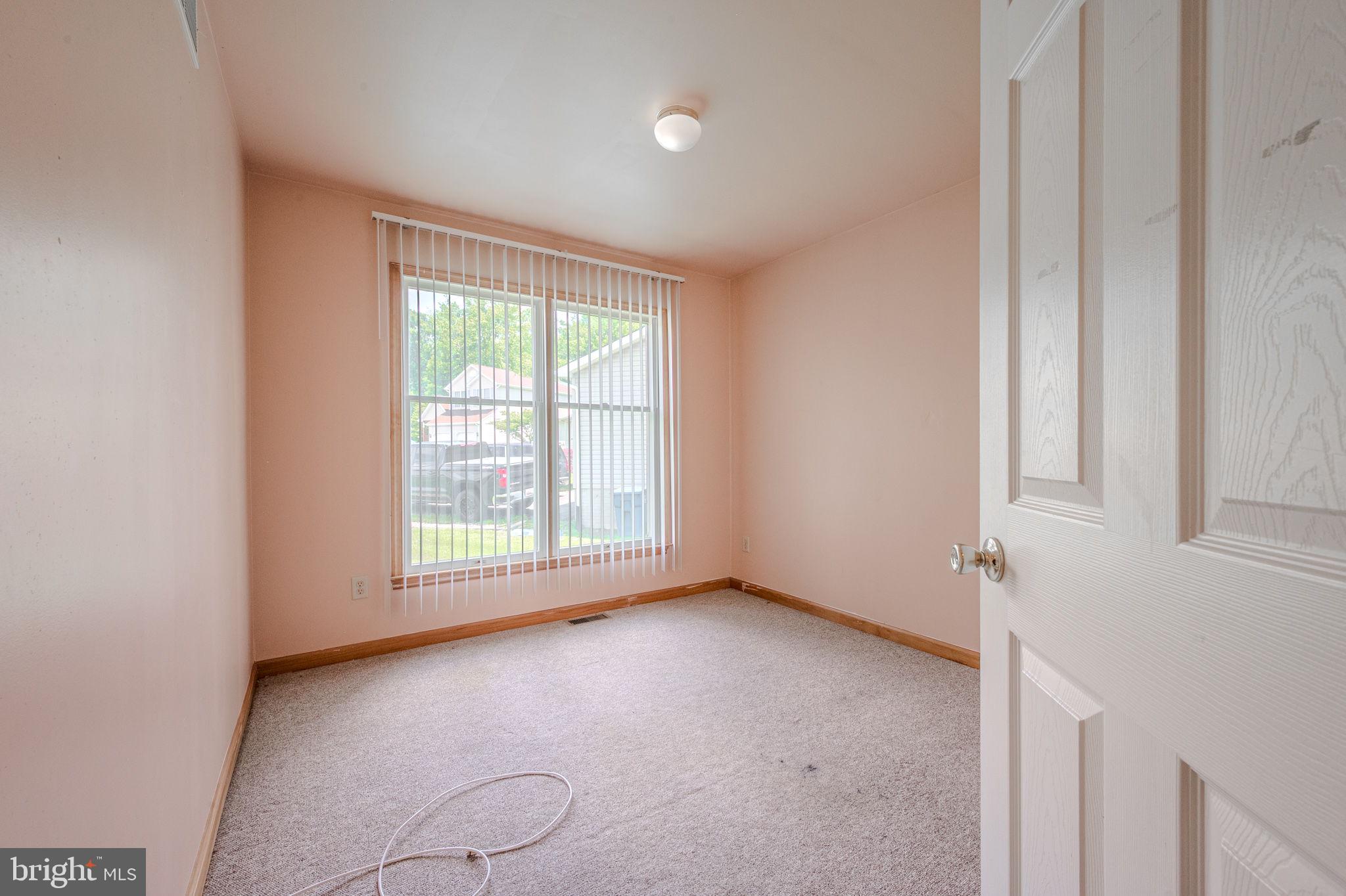 6 Windsor Court Elkton, MD 21921 - Photo 17 of 37 a view of an empty room with a window