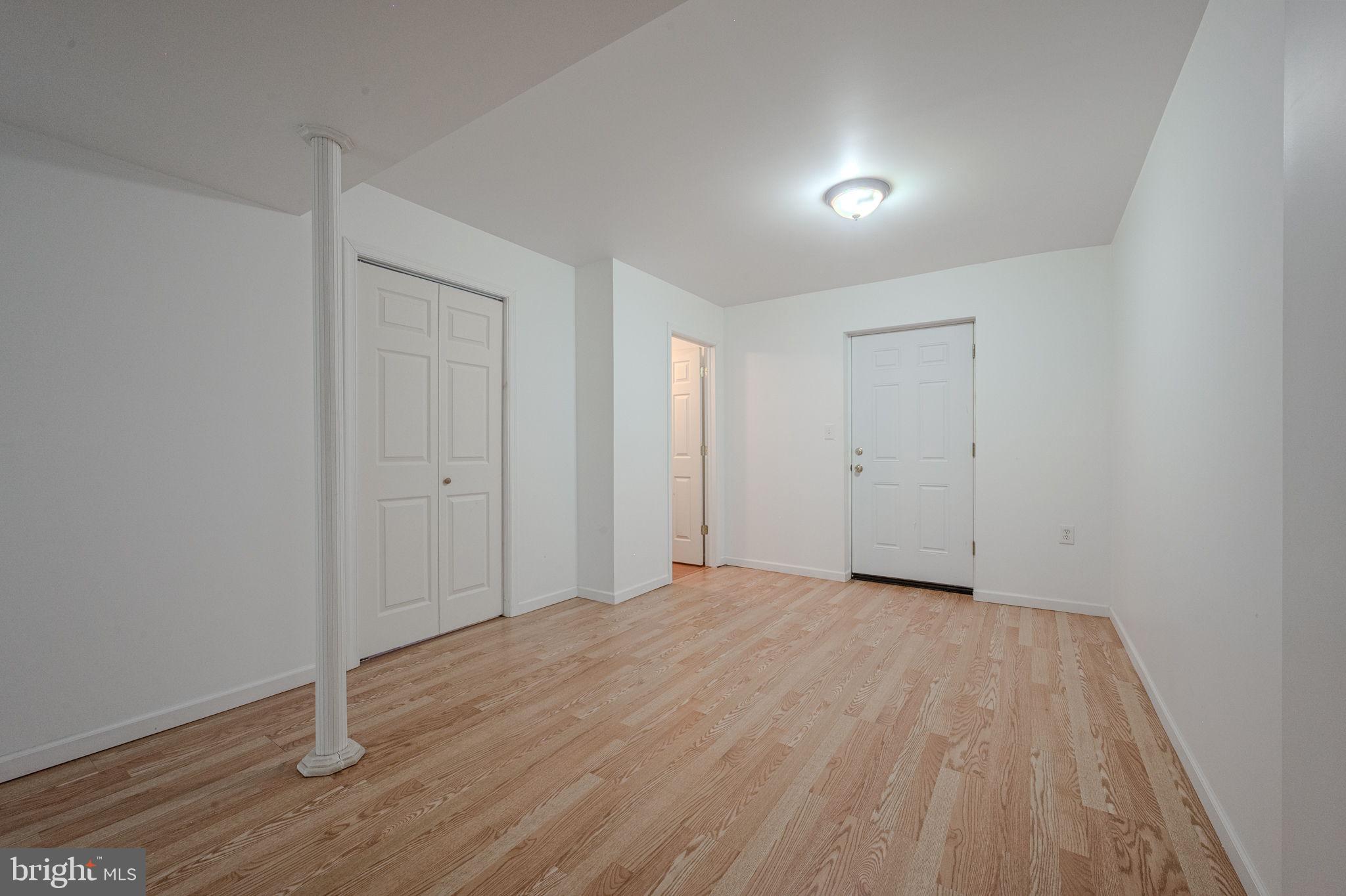 6 Windsor Court Elkton, MD 21921 - Photo 27 of 37 a view of empty room with wooden floor