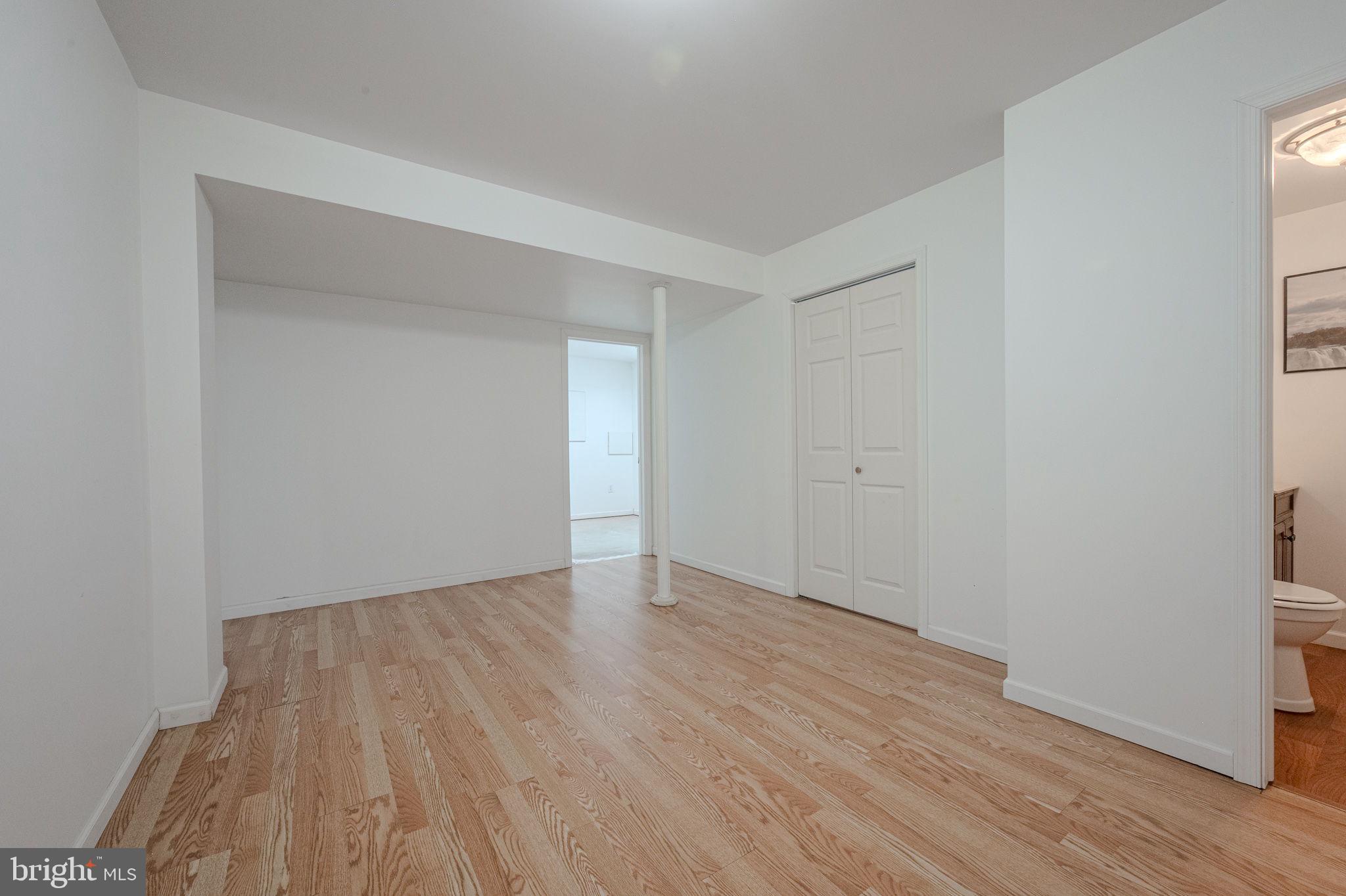 6 Windsor Court Elkton, MD 21921 - Photo 28 of 37 a view of an empty room with wooden floor