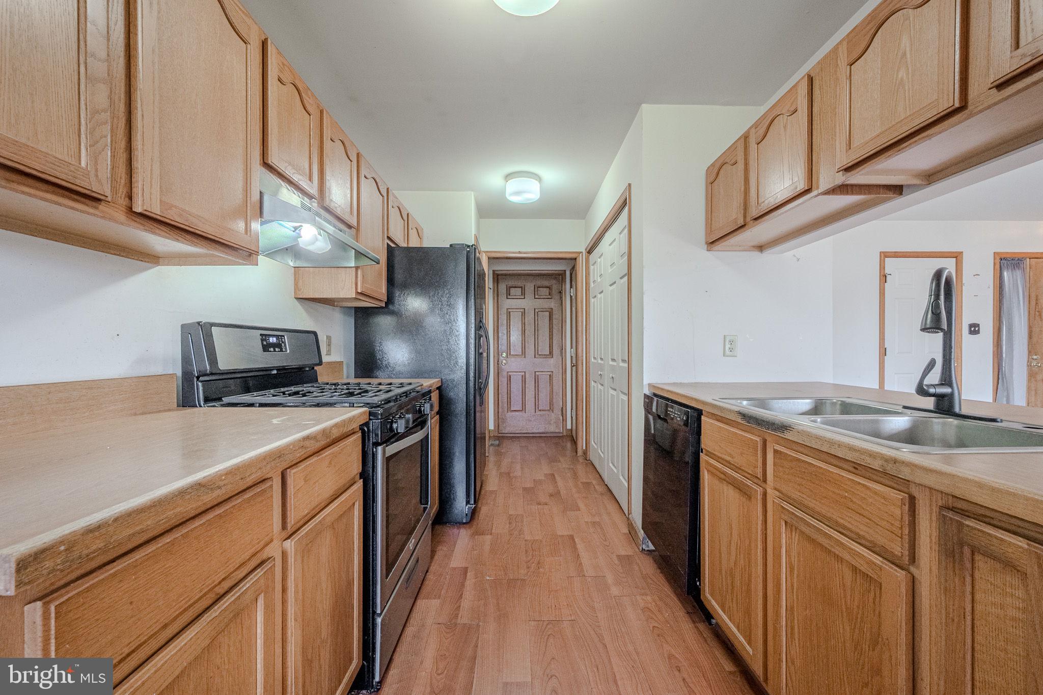 6 Windsor Court Elkton, MD 21921 - Photo 10 of 37 a kitchen with stainless steel appliances granite countertop a stove and a sink