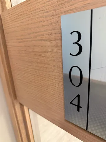 a view of a livingroom with furniture and wooden floor
