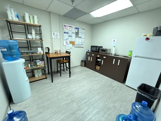 a front view of a house with a garage