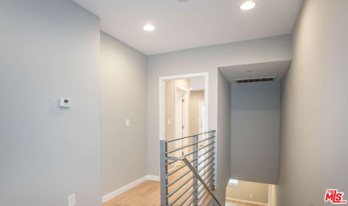 6546 La Mirada Avenue, Unit 6548 Los Angeles, CA 90038 - Photo 16 of 24 a view of entryway with wooden floor