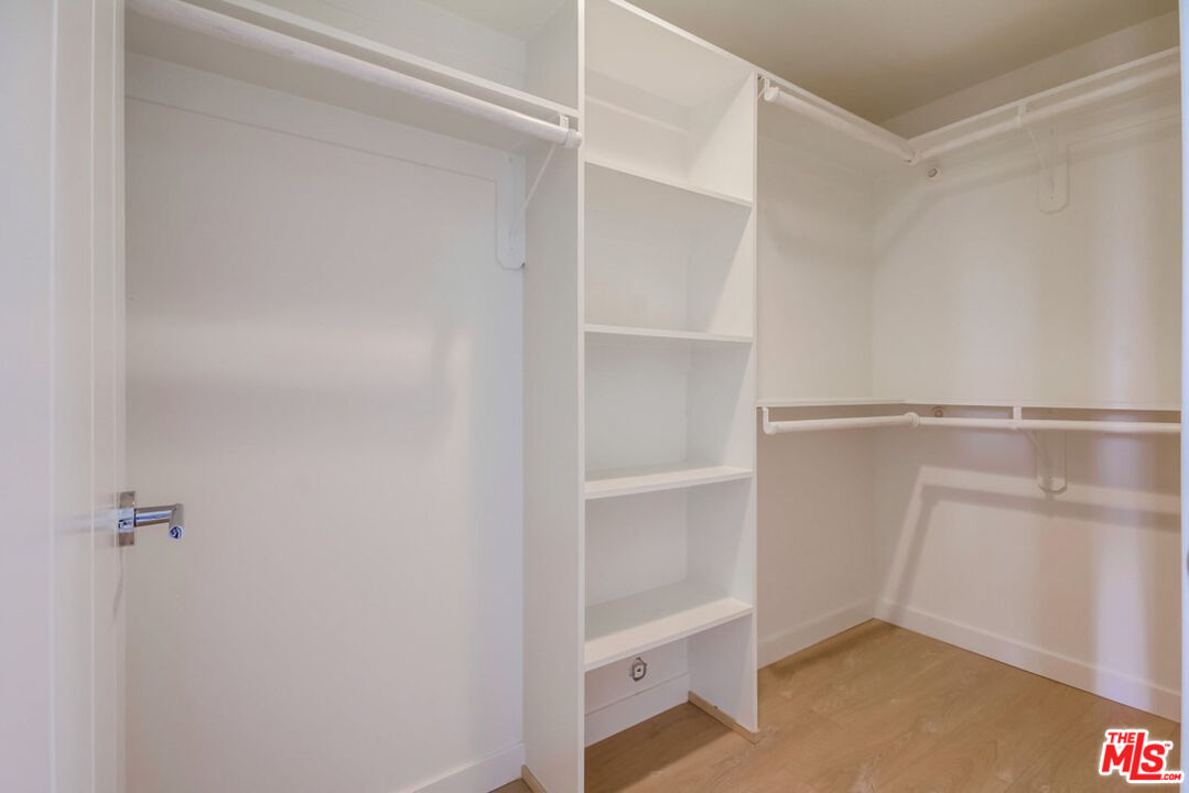 6546 La Mirada Avenue, Unit 6548 Los Angeles, CA 90038 - Photo 3 of 24 a view of an empty walk in closet