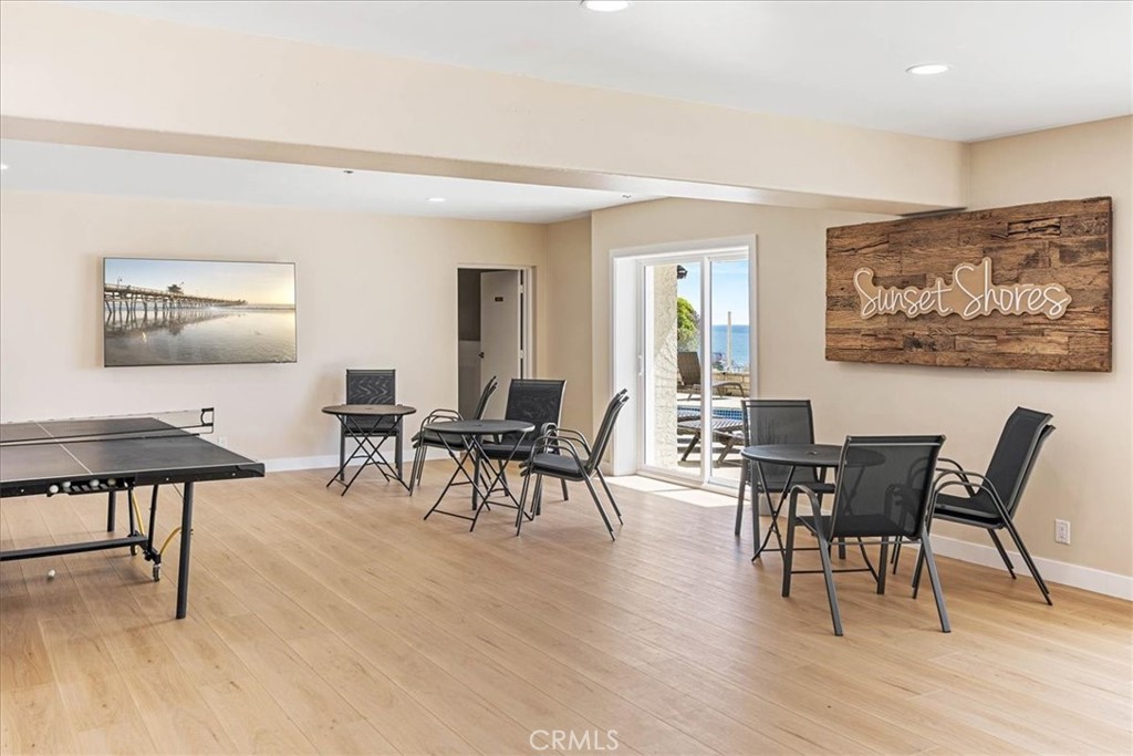 410 Corto Lane, Unit 9 San Clemente, CA 92672 - Photo 41 of 50 a view of a dining room with furniture and wooden floor