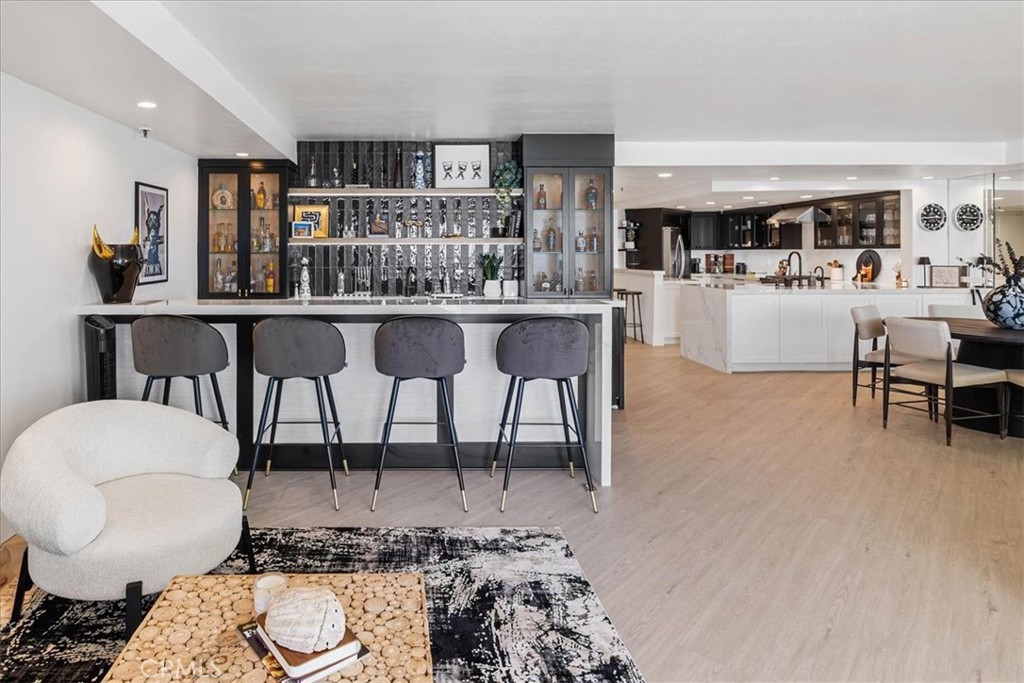 410 Corto Lane, Unit 9 San Clemente, CA 92672 - Photo 7 of 50 a living room with furniture and a wooden floor
