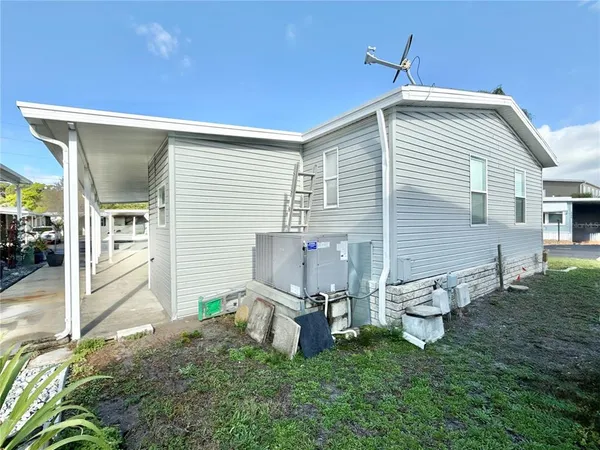 a view of a back yard of the house