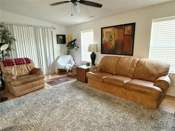a living room with furniture and a couch
