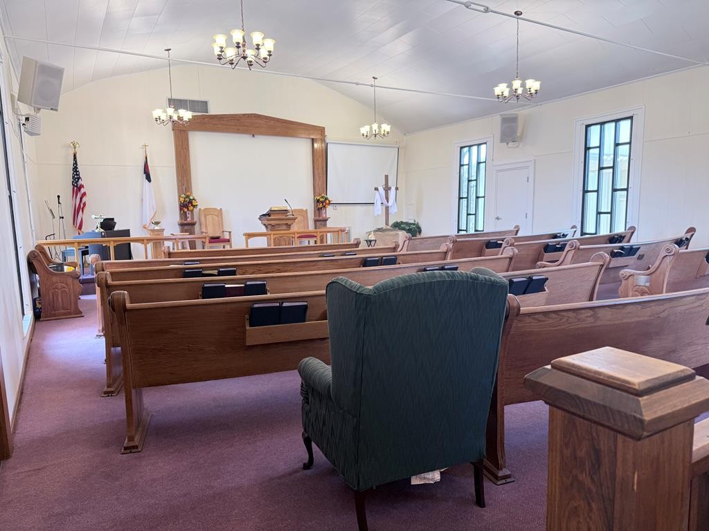 10926 Lafayette Road Herndon, KY 42236 - Photo 15 of 42 a living room with furniture a large window and a chandelier