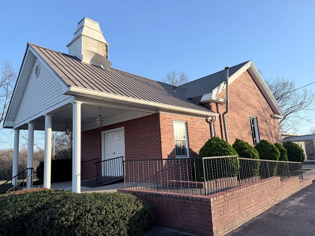 10926 Lafayette Road Herndon, KY 42236 - Photo 2 of 42 a view of a house with iron fence