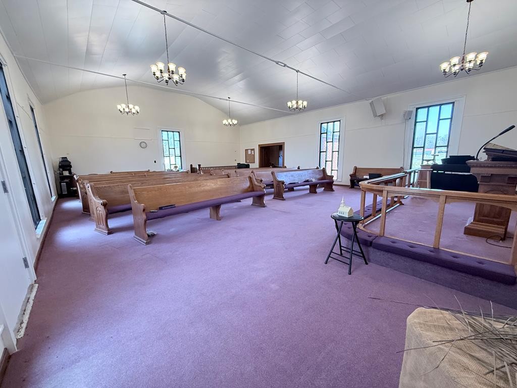 10926 Lafayette Road Herndon, KY 42236 - Photo 22 of 42 a living room with furniture a dining table and a chandelier
