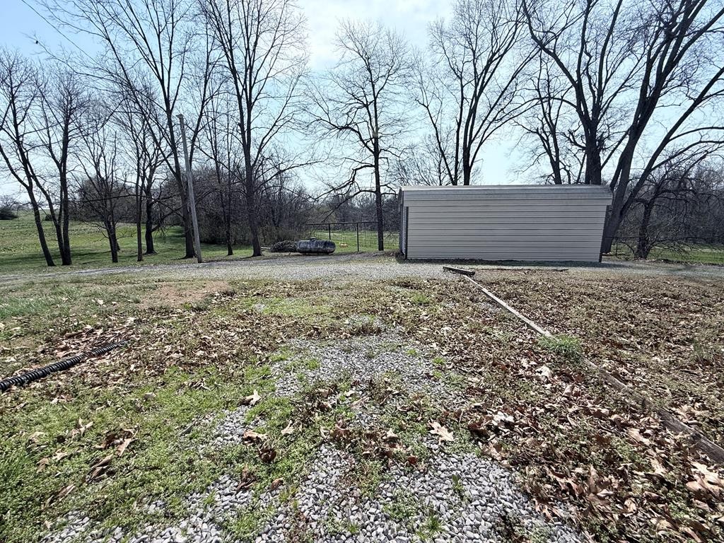 10926 Lafayette Road Herndon, KY 42236 - Photo 38 of 42 a view of a yard with trees