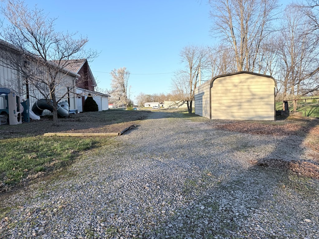 10926 Lafayette Road Herndon, KY 42236 - Photo 8 of 42 a view of a house with a snow in the yard