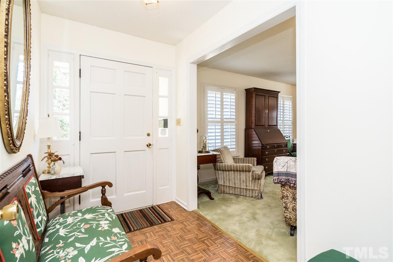 7301 Fiesta Way Raleigh, NC 27615 - Photo 2 of 25 a living room with furniture and a window