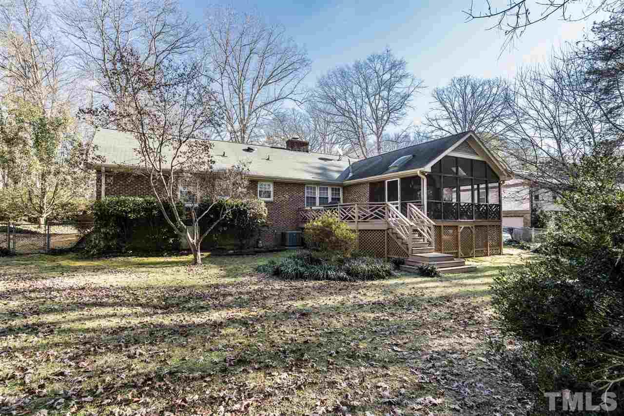7301 Fiesta Way Raleigh, NC 27615 - Photo 24 of 25 a front view of a house with a yard