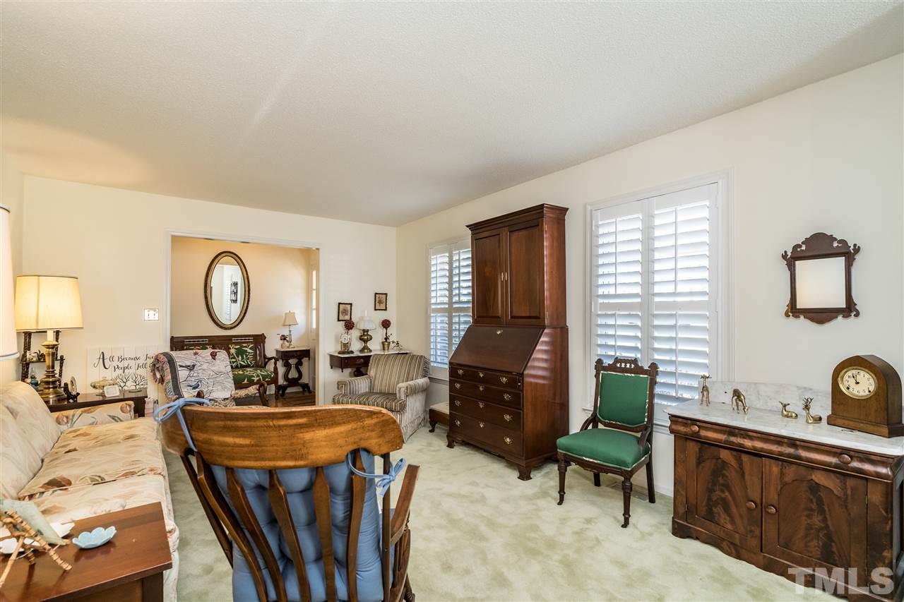 7301 Fiesta Way Raleigh, NC 27615 - Photo 4 of 25 a view of a livingroom with furniture