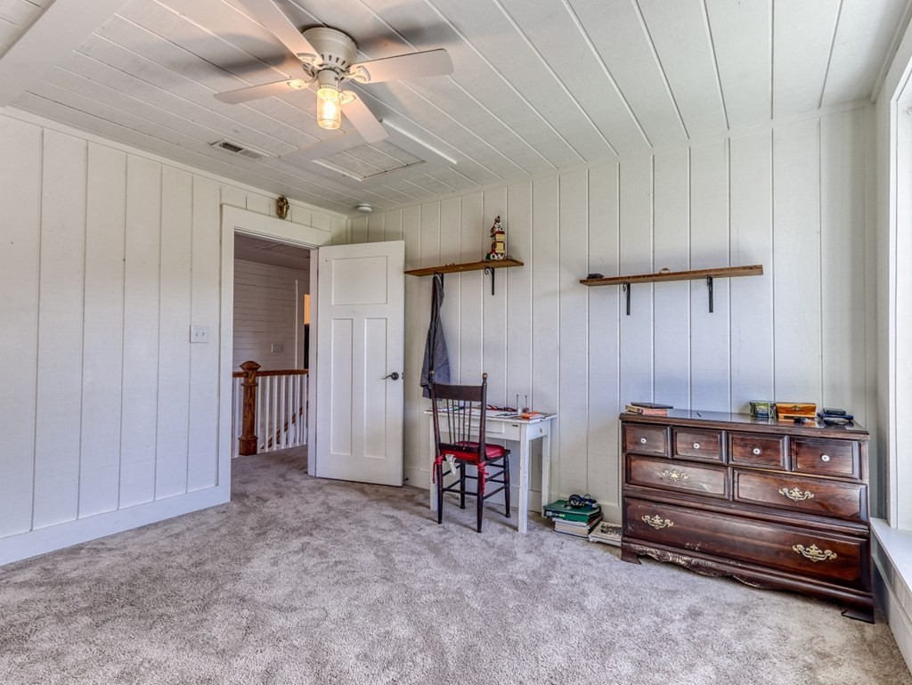 2712 Hodges Ferry Road Kodak, TN 37764 - Photo 32 of 49 a view of room with furniture and a chandelier fan