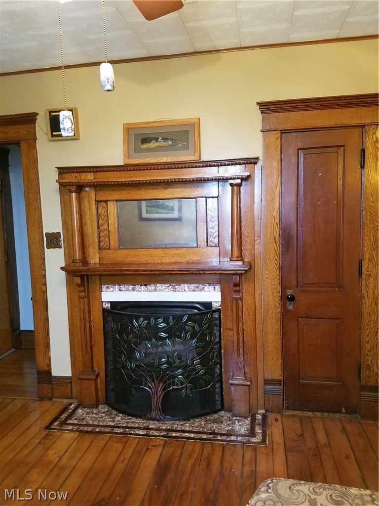 44112 Archers Ridge Road Caldwell, OH 43724 - Photo 6 of 30 decorative fireplace with electric insert in living room
