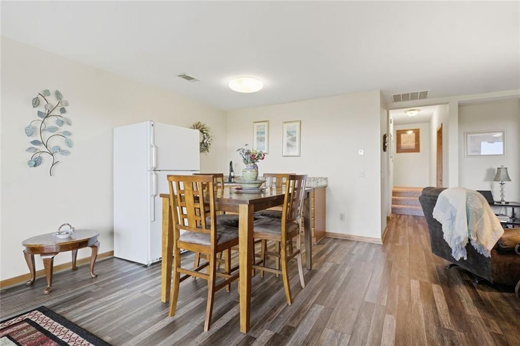 251 Panorama Point Jasper, GA 30143 - Photo 47 of 93 a view of a dining room with furniture and wooden floor