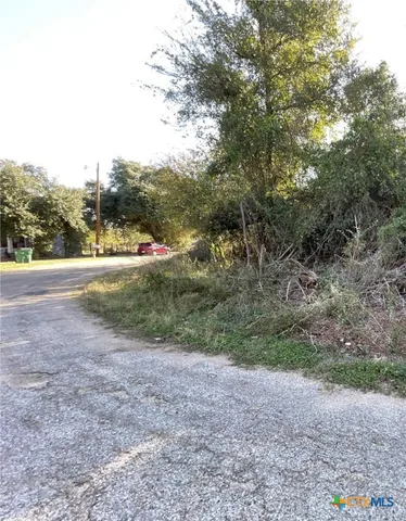 a view of an outdoor space with trees