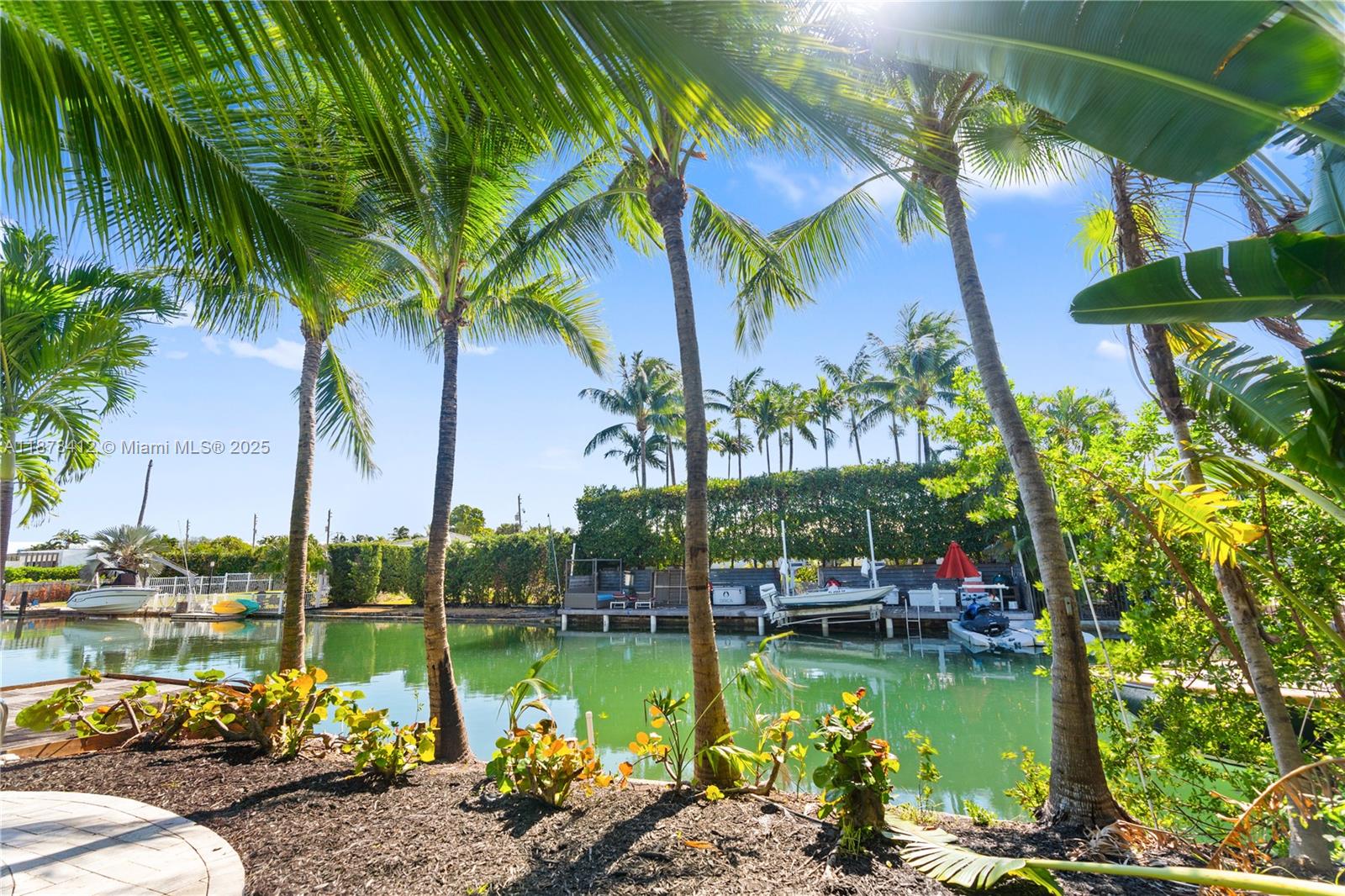1710 Cleveland Road Miami Beach, FL 33141 - Photo 28 of 36 a view of swimming pool with a table and chairs