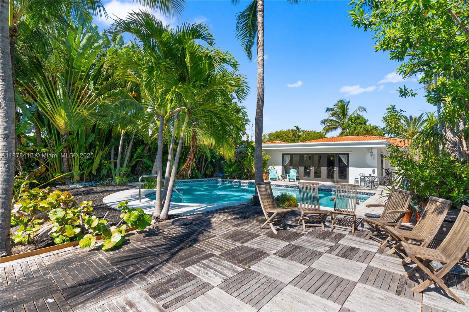 1710 Cleveland Road Miami Beach, FL 33141 - Photo 33 of 36 a view of a patio with table and chairs potted plants