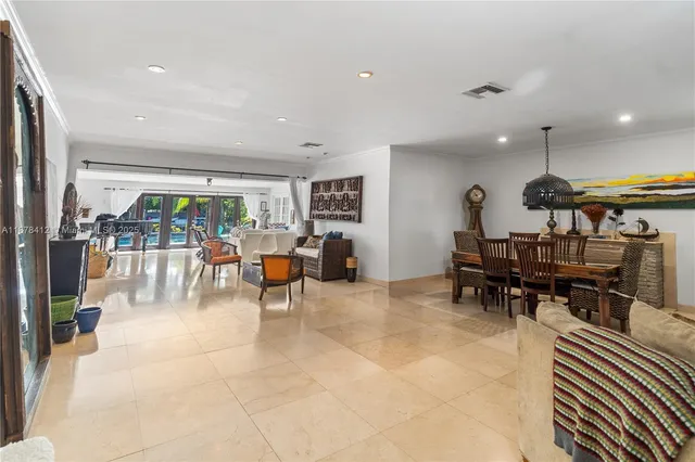 a view of a living room and dining room